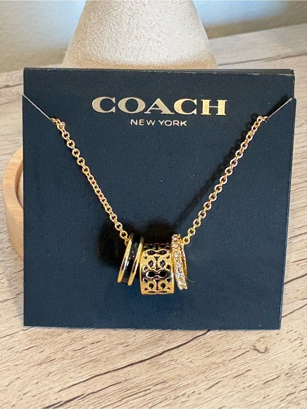 Coach Gold-Tone & Black Enamel with Crystal Rondel Logo Pendant Necklace